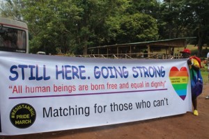 Un activista de la comunidad LGBTI de Uganda en una marcha en Entebbe en 2013. Crédito: Amy Fallon/IPS.